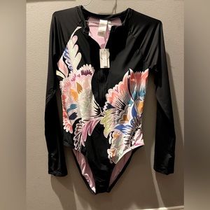 NWT One piece Trina Turk long sleeve swimsuit.